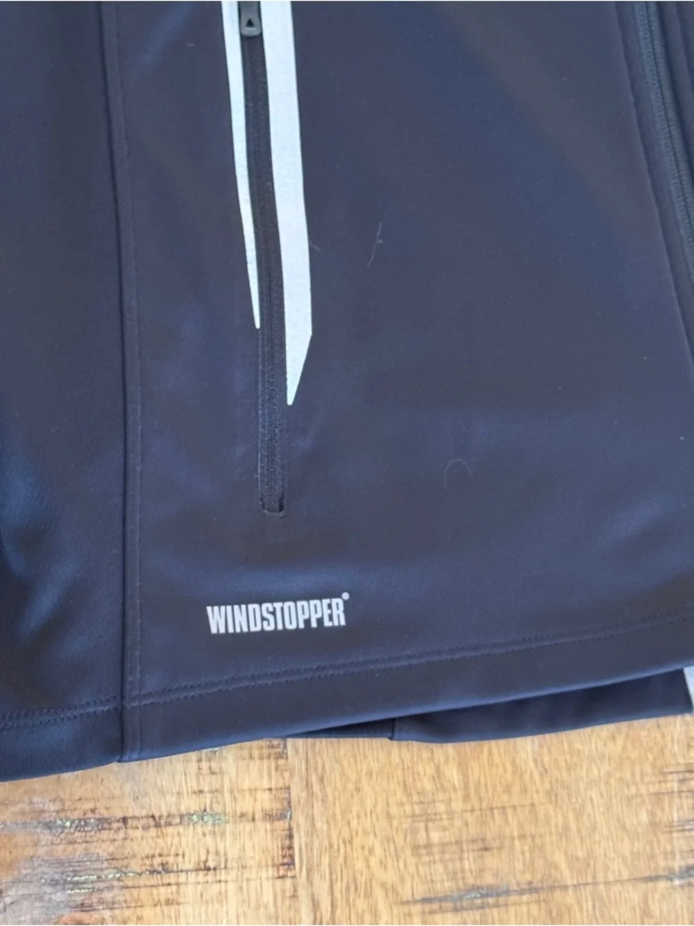 The North Face Men’s Black Lightweight Windstopper Jacket with Reflective Trim
